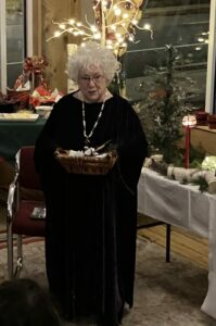 Life-cycle Celebrant Zita Christian offers messages from the trees in a Winter Solstice ritual.